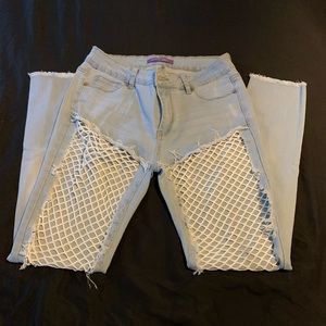 Lite blue jeans with net in the front